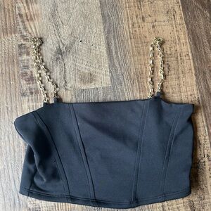 Black going out top with gold chain straps